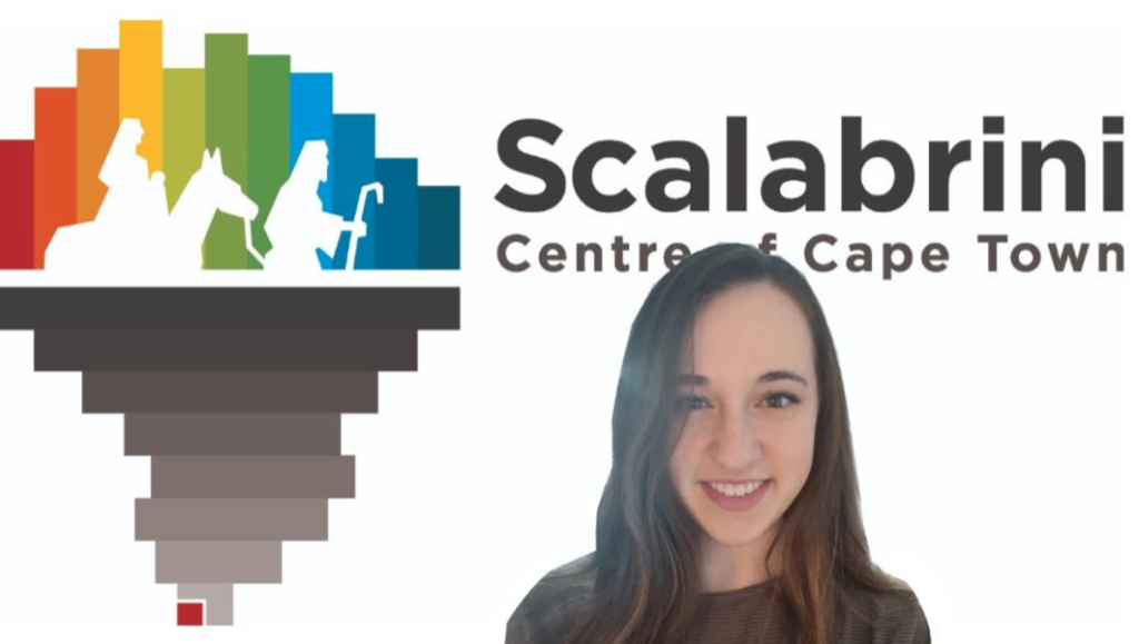 Girl Smiling at the camera in front of Acalabrni Centre of Cape Town logo Zoom background. 